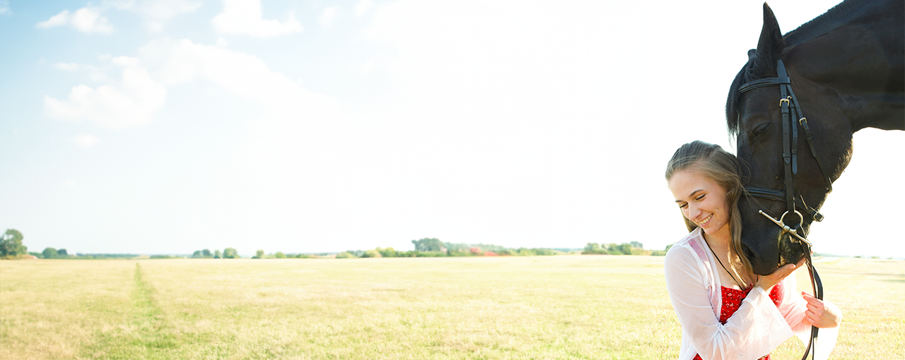 girl-with-black-horse.png__PID:f9910434-c116-4c3c-8c5a-c90fa8f6bd32