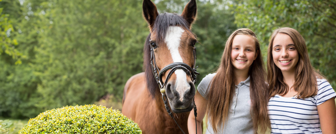 girls-with-horse.png__PID:b66df991-0434-4116-8c3c-8c5ac90fa8f6